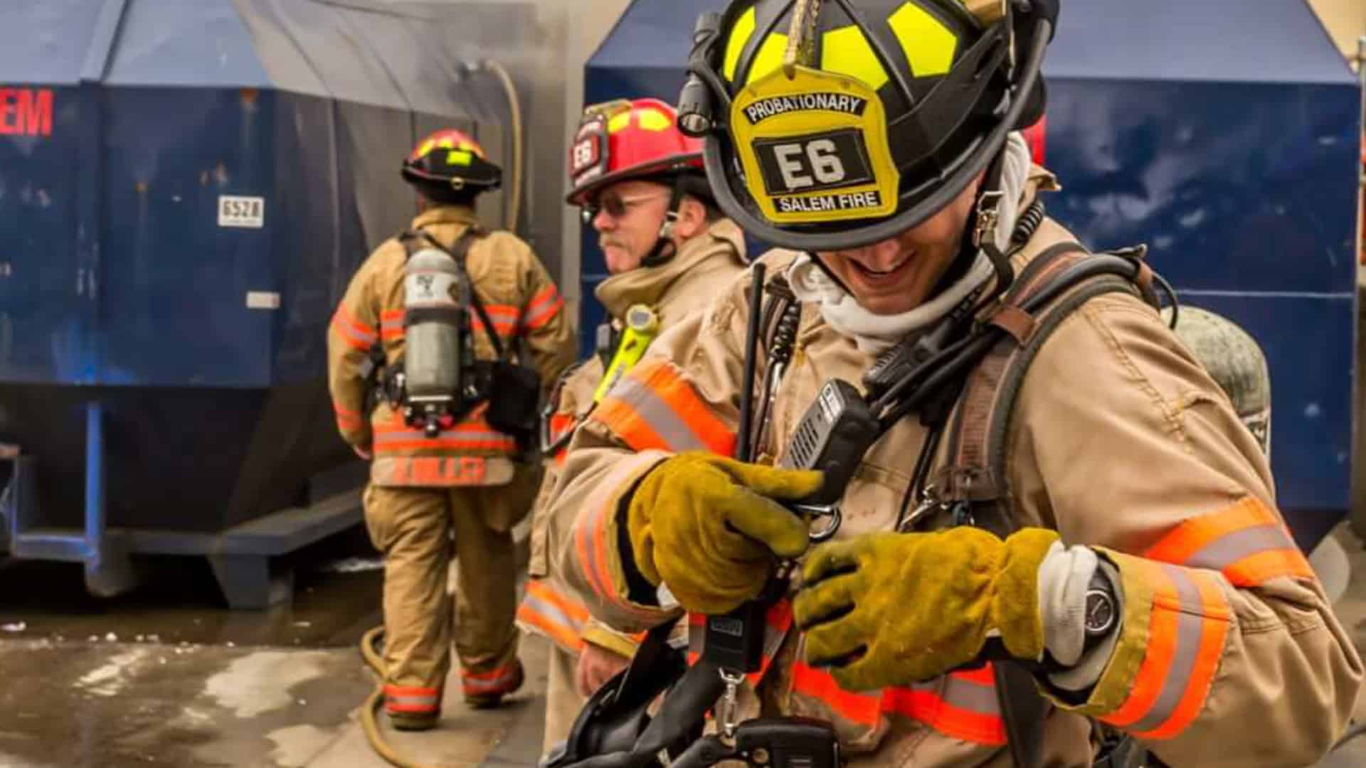 Salem fire foundation slide firefighter putting on gear
